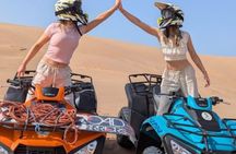 quad bike tour in the desert sand dunes