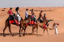 Dubai Desert Safari with Quad Bike, Camel Ride & BBQ Dinner Feast