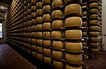 From Reggio Emilia Mediopadana Tour of Parmigiano and Parmaham