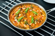 Market Tour & Paella Cooking With Wine in Central Barcelona
