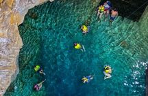 Quick Getaway Cave Expedition and Cenotes Swim from Merida