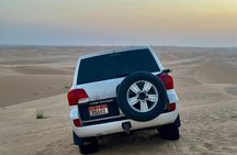 Private Sunrise Desert Safari Tour with Camel ride & Sandboarding