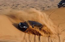 Premium Desert Safari Camel Ride with Sandboarding and BBQ Dinner