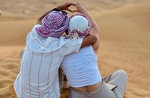 Premium Desert Safari Camel Ride with Sandboarding and BBQ Dinner