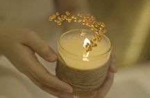 Experience the unique Revitalizing Soy Candle Massage
