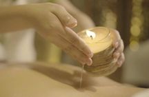Experience the unique Revitalizing Soy Candle Massage