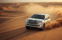 Desert Safari in Doha: Dune Bashing Camel Ride & Sandboarding