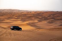 Dubai Desert Safari Camels with Dune Bashing and BBQ Dinner