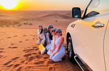  Dubai Desert Safari With BBQ Dinner, Sandboarding, Camel Ride 