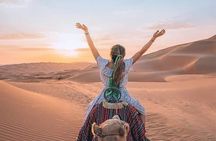  Dubai Desert Safari With BBQ Dinner, Sandboarding, Camel Ride 