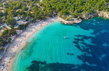 Ibiza Beach Hopper with Lunch Open Bar Paddle Surf and Snorkeling