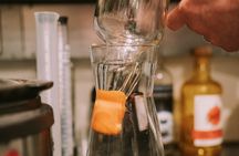 Distill a bottle of Gin on mini copper stills