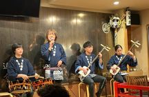 Tsugaru shamisen performance over traditional dinner