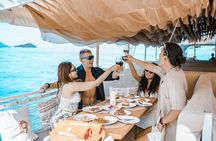 Rhapsody Phuket Coral & Racha Sunset Catamaran Cruise