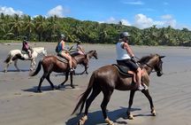 Horseback riding through the beaches of Esterillos near Jaco