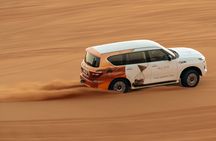 Dubai Red Dunes Safari with Dune Bashing, Camel Ride, BBQ Dinner