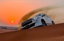 Sunset Desert Safari with Dune Bashing and Camel Rides Dinner