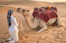 Dubai Quad Bike Evening Safari with BBQ Dinner & Camel Ride