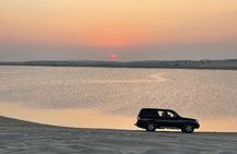 Doha Half-Day Desert Safari with Dune Bashing Camel Ride 