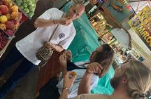Food tour in Cali with exotic fruits, breads and drinks