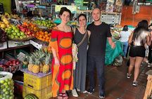 Food tour in Cali with exotic fruits, breads and drinks