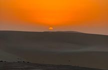 Doha Desert safari Sunset-Sandboarding camel ride & Dune Bashing