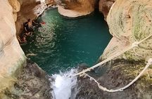 Group Tour to Wadi Shab Hike, Swim, Cave, Sinkhole & Fins Beach