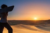 Sunset camel trekking Merzouga desert and sandboarding
