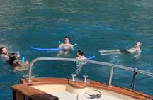 From Naples Boat trip to Capri visit to the city swim stop