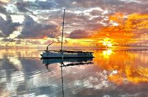 Sunset excursion on a unique polynesian sailing outrigger