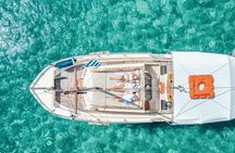 Celebrate with a Private Wooden Boat Party in Mykonos