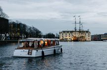Explore Amsterdam's Canals Aboard a Cozy Small Group Cruise