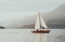 Shared Catamaran Sailing Tour on Lake Como with Snacks