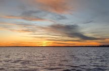 Seaside Cruising Dolphin Watching and Sunset Cruises