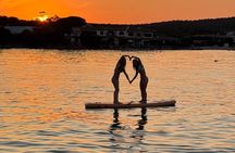 Sunset with dolphins and aperitif on a sailboat in Golfo Aranci