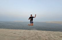 Doha airport layover transfer private desert safari camel ride