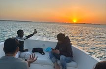 Sunset Cruise with Etihad Tower Views and Beach Walk