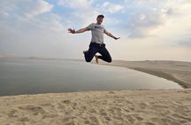 Doha airport layover transfer private desert safari camel ride