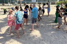 Coquito Drink and Salsa Beach Class