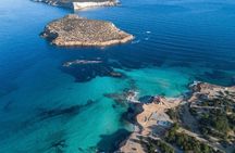 Ibiza Beach Hopper with Lunch Open Bar Paddle Surf and Snorkeling