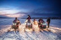Snowmobile Night Tour Rovaniemi in small group