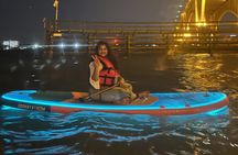 Nighttime iSUP Glow Paddleboard Adventure in Daytona Beach