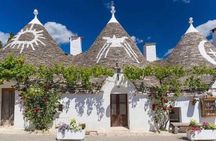 Best of Alberobello trulli & Polignano a mare bus tour from Bari