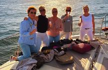 Dolphin Searching Sunset Cruise with Bottle of Cava & Snacks