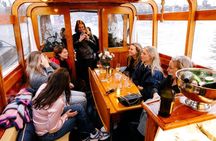 Explore Amsterdam's Canals Aboard a Cozy Small Group Cruise