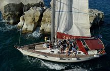 Milos and Polyaigos Sailing Yacht Cruise with Lunch and Drinks