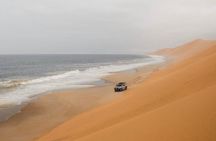 Half Day Desert Safari Sunset Inland Sea Tour with Sandboarding