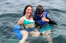 Private Boat Cruise with Snorkel Free Drinks and Natural Pool