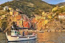 Cinque Terre sunset boat tour with a traditional ligurian gozzo