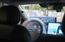 Guangzhou: Self-Driving Robotaxi Experience with Guide